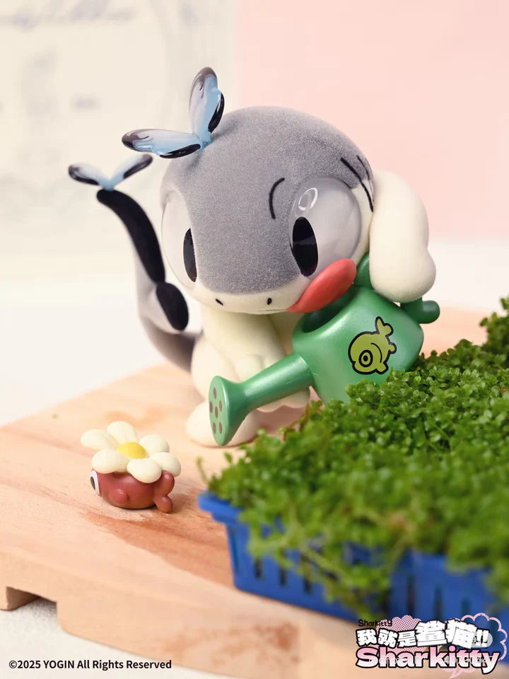 Sharkitty blindbox vinyl figure close-up watering plant with green can