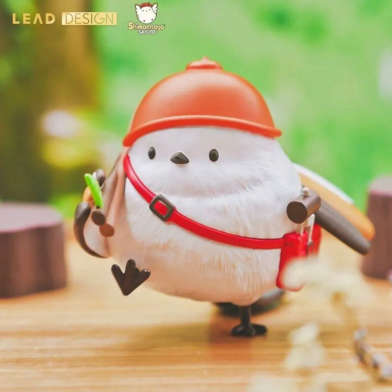 Shimaenaga Sayuri Architect vinyl figure with orange helmet, holding blueprint.