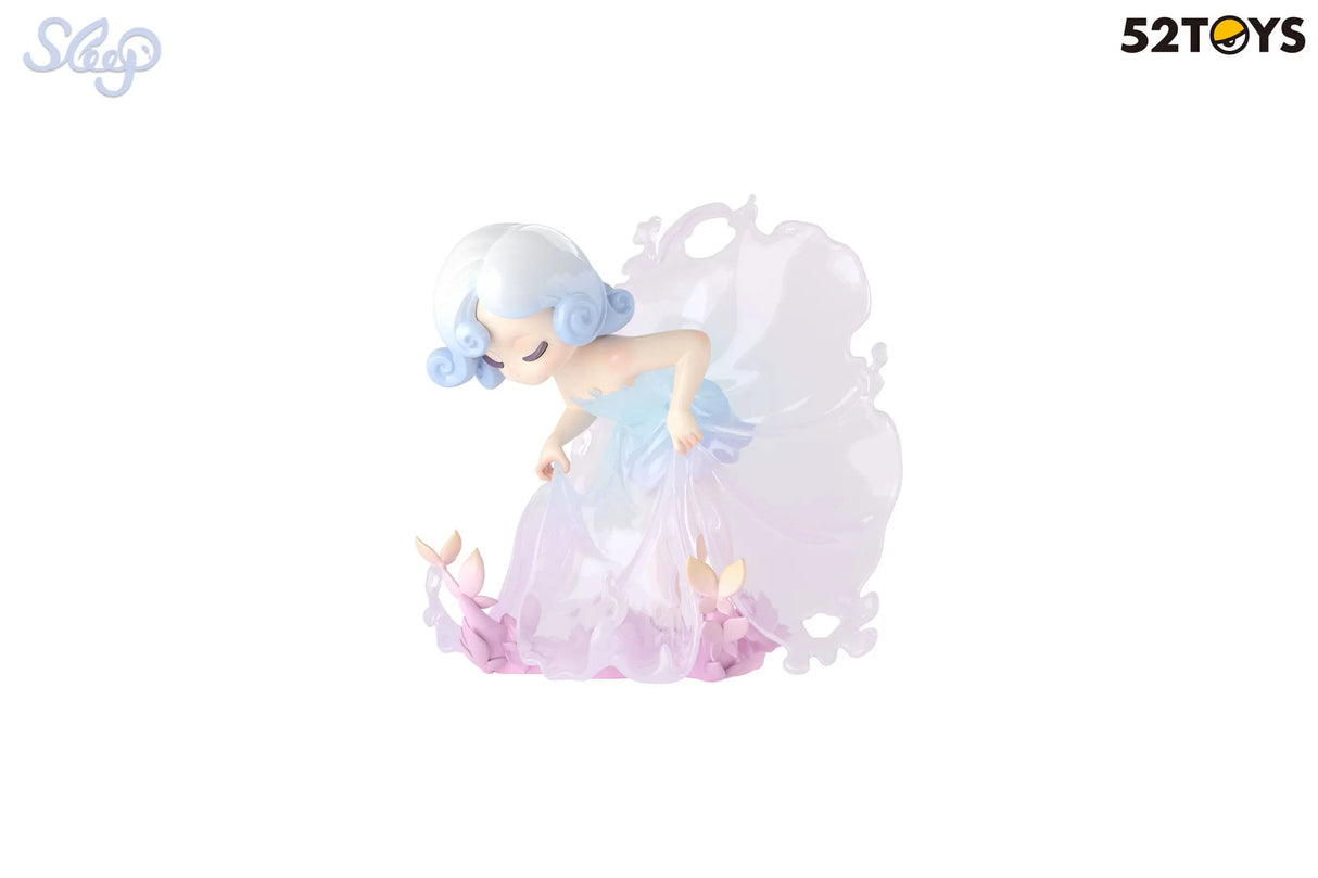 Dreamy fairy princess kneeling in a garden, surrounded by flowers and iridescent gown.