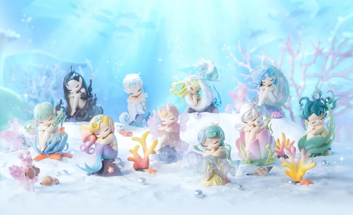 Full group display of all 8 elemental Sleep Sea Elf vinyl figures in an undersea environment.