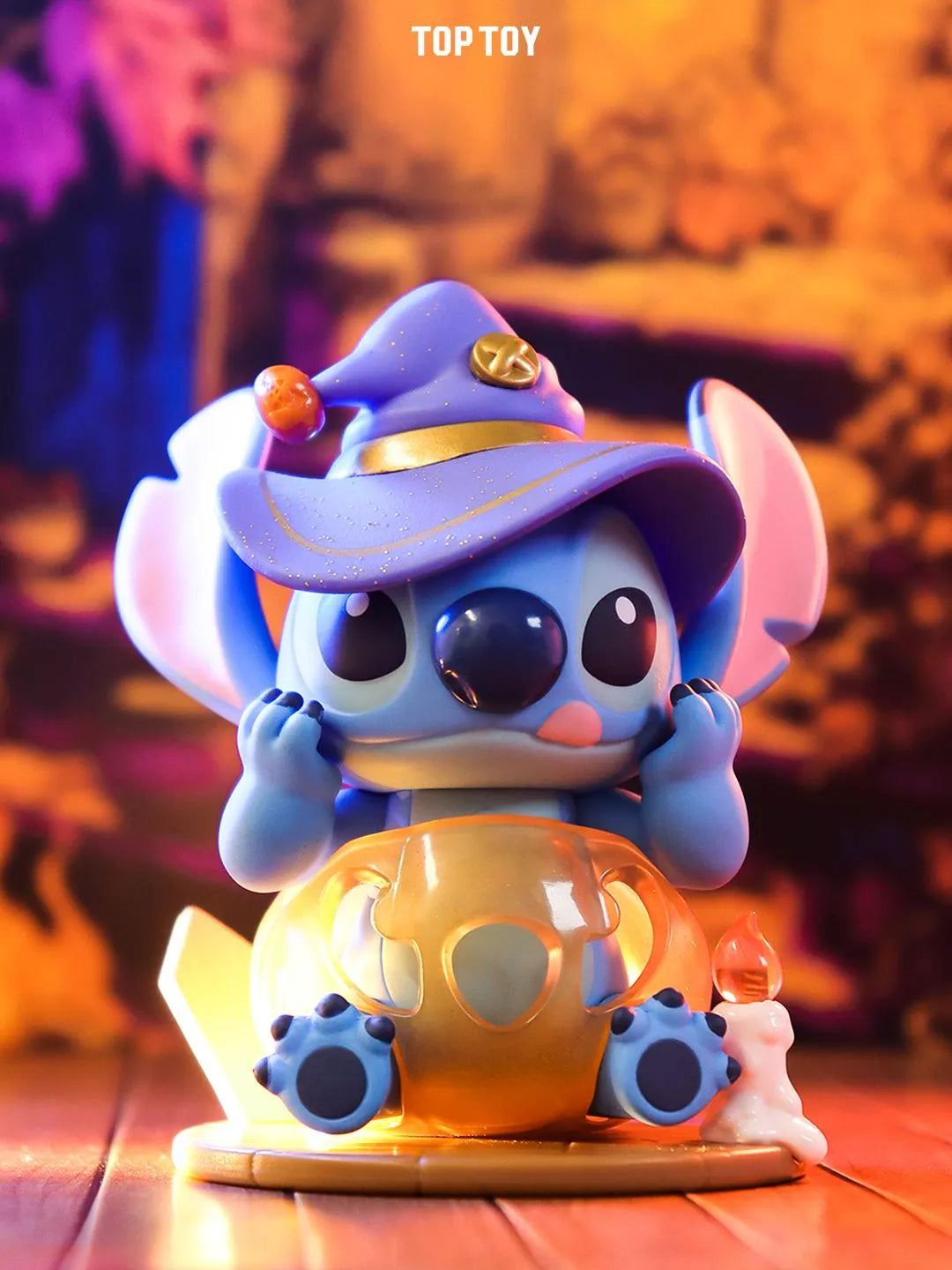 Witch Stitch vinyl toy sitting in pumpkin cauldron with pointed hat from Weird Diary Blind Box.