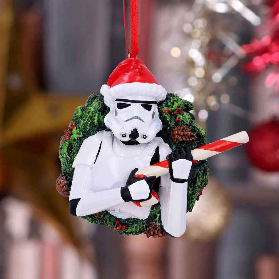 Stormtrooper wreath ornament hanging on a Christmas tree
