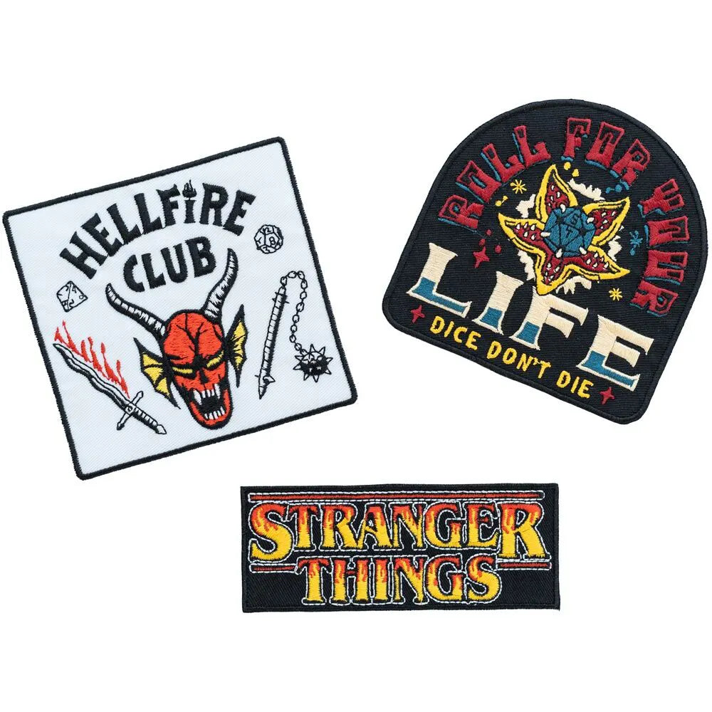 Three Stranger Things patches including Hellfire Club, Roll for Your Life, and logo design