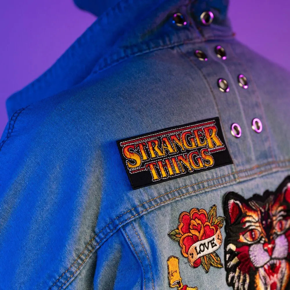 Stranger Things logo patch embroidered on a denim jacket