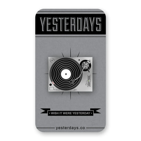 Vinyl-themed enamel pin mounted on collector card