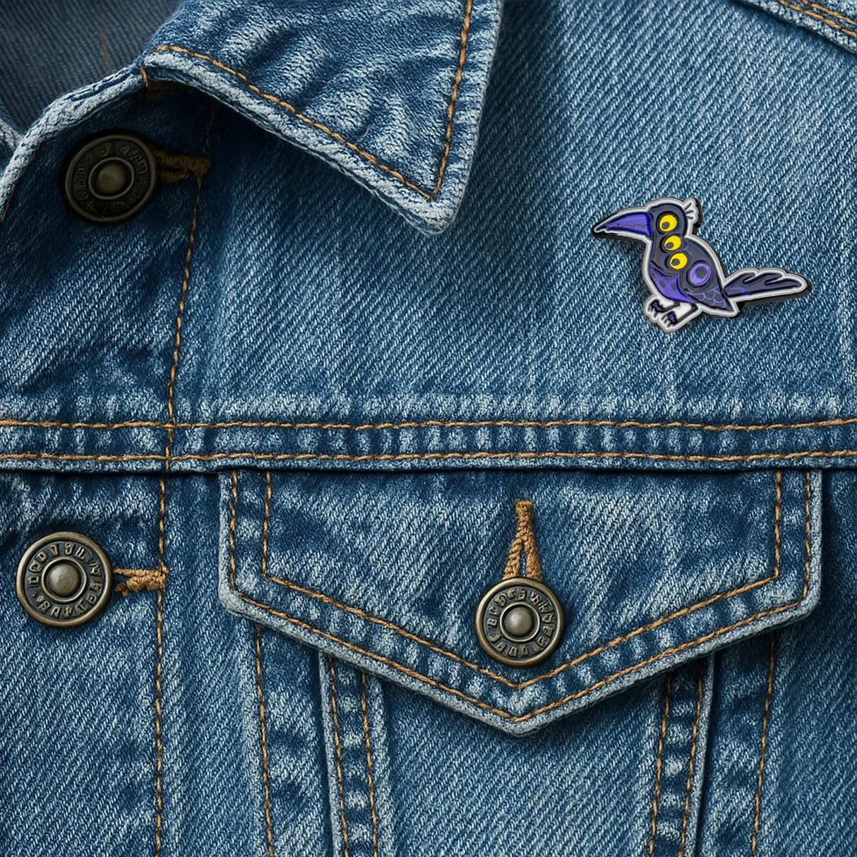 Sussie pin worn on denim jacket