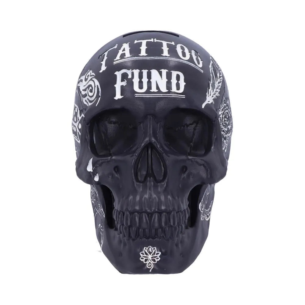 Black skull piggy bank with tattoo-style design – front view