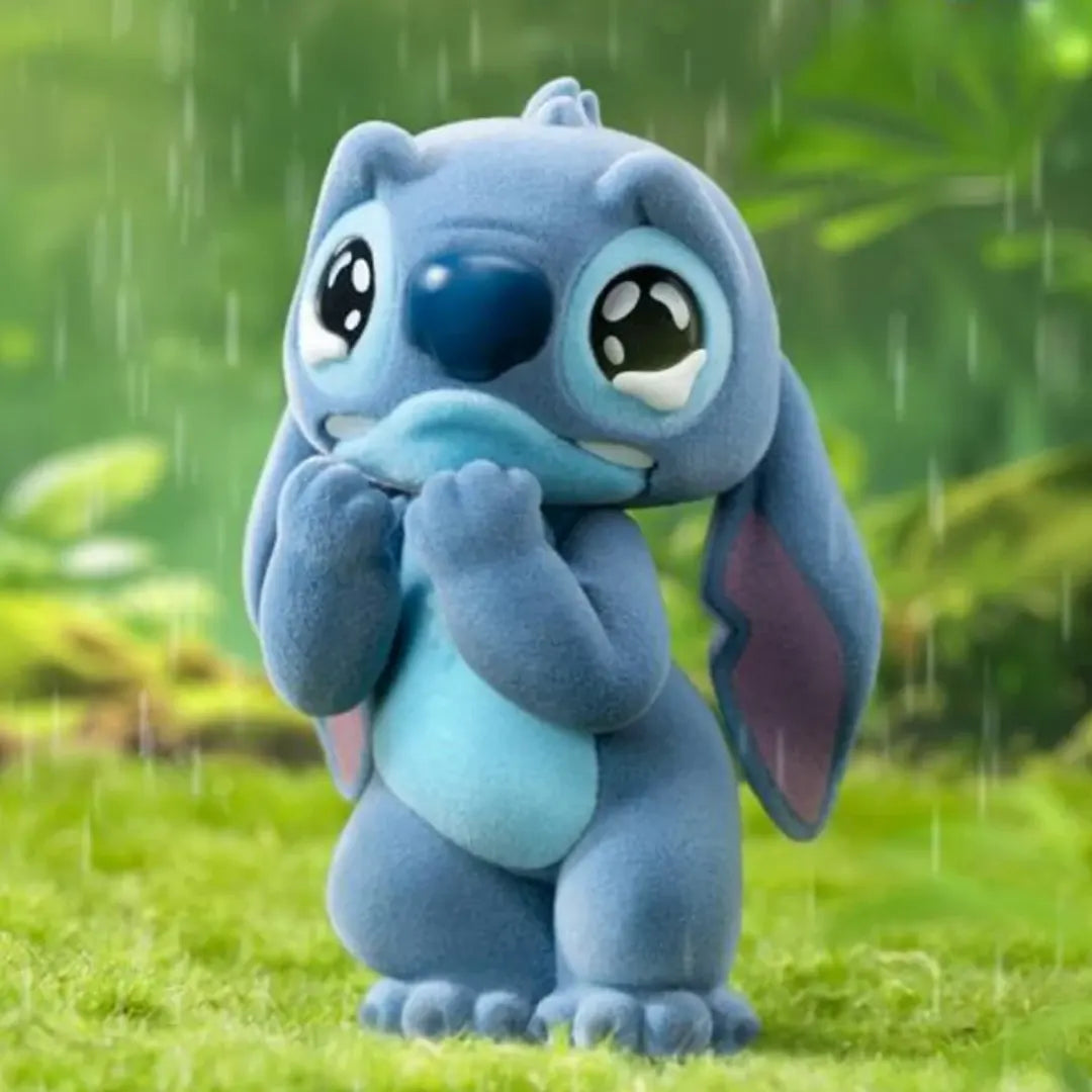 Crying Stitch flocked vinyl figure standing in the rain with sad expression
