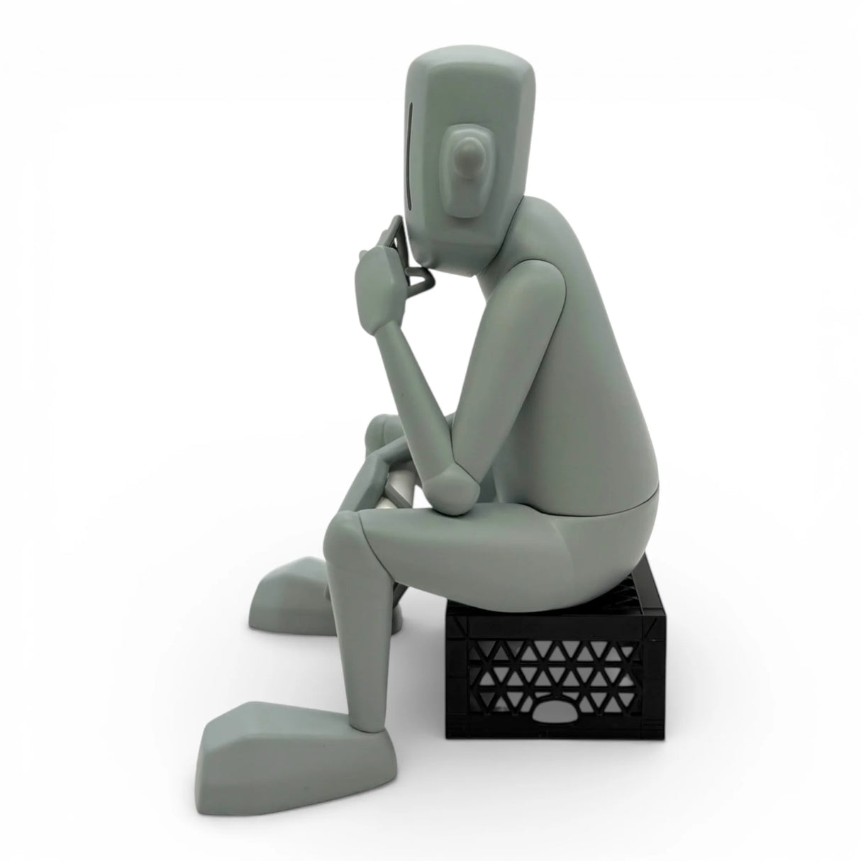 chrisrwk thinker vinyl figure angled front seated robot