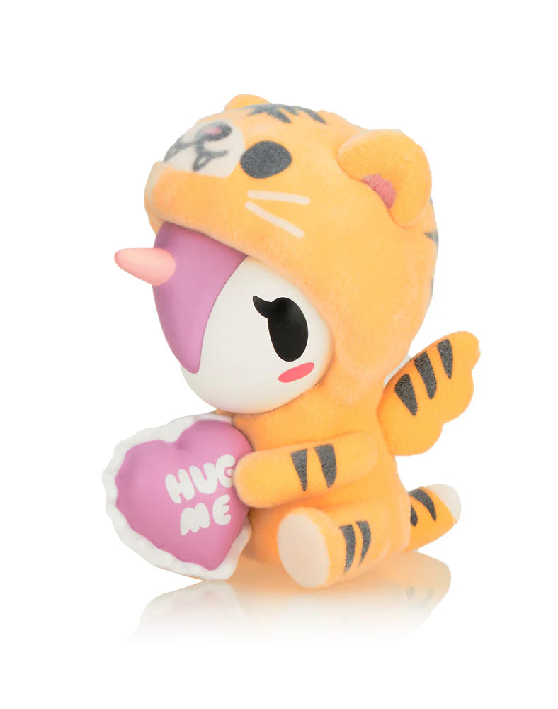 Cozy Unicorno tokidoki figure in tiger pajama costume holding heart