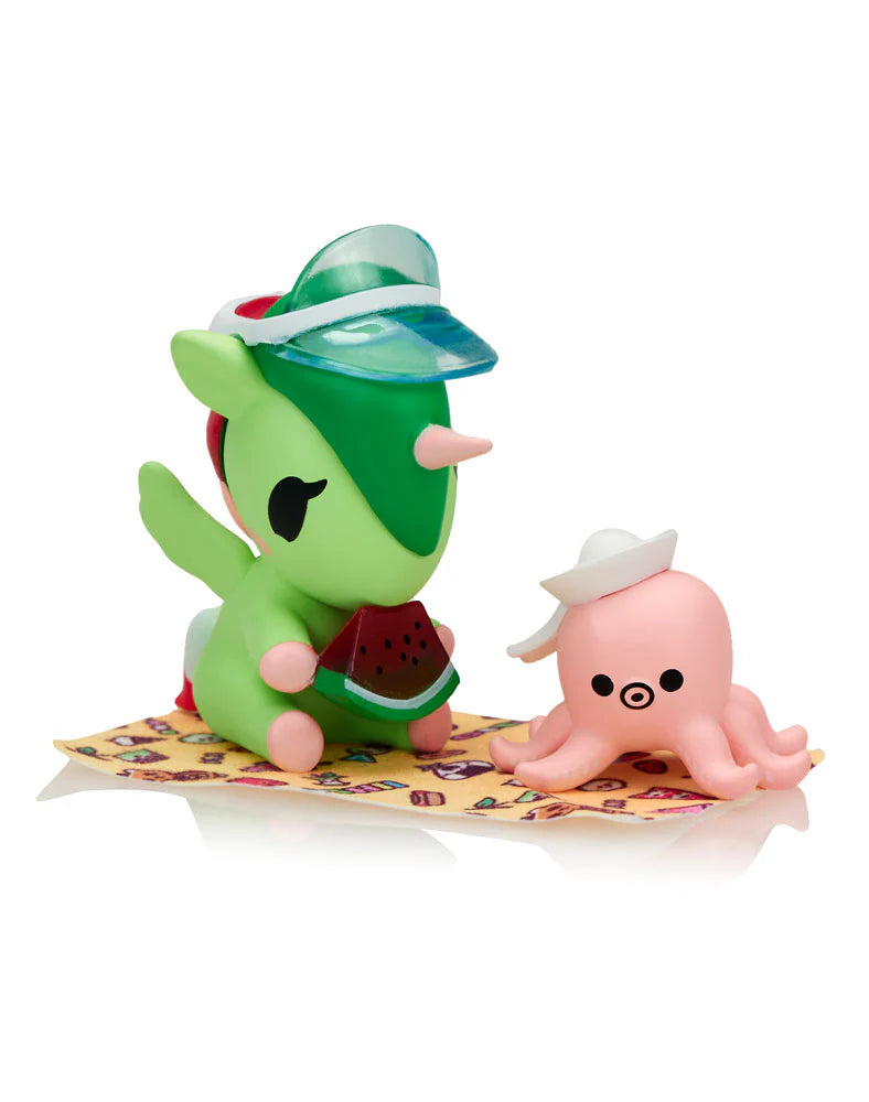 Fun in the Sun Unicorno figure eating watermelon with small pink octopus