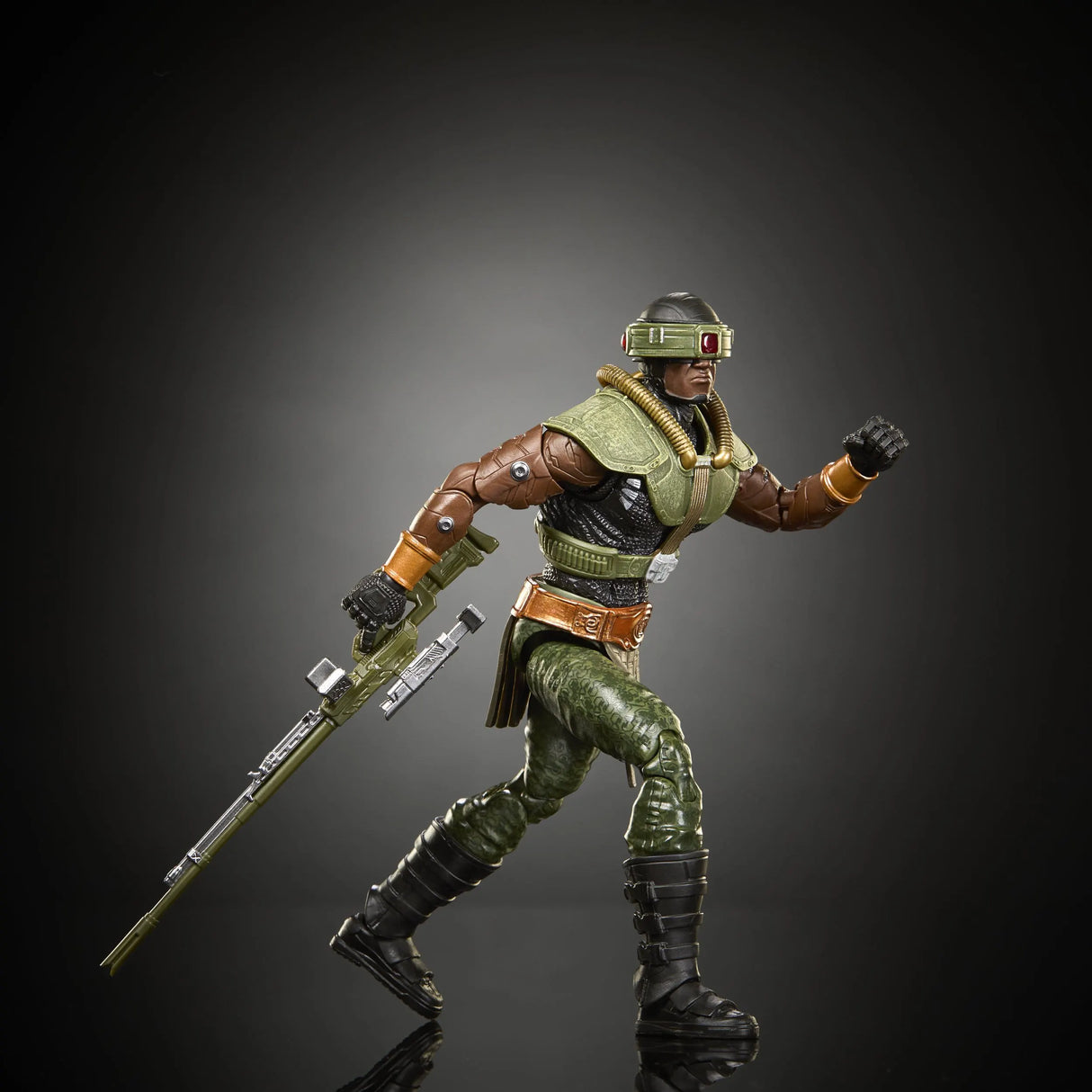 Tri-Klops action figure running with rifle accessory from Masters of the Universe Chronicles