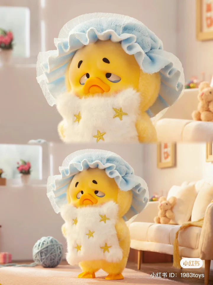 Upset Duck pajama edition holding star-pattern pillow and wearing bonnet