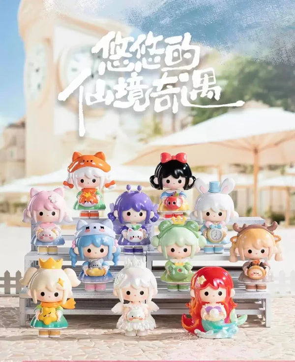 Full set of UU’s Fairy Journey Mini Series Blind Box figures displayed on tiered stands outdoors