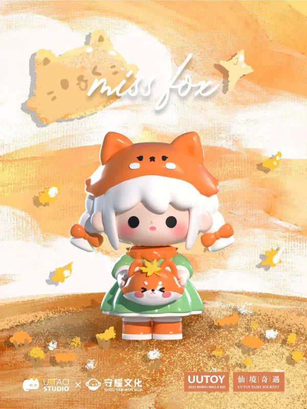 UU’s Fairy Journey Mini Series Blind Box figure of Miss Fox in orange hood and green dress holding fox plush