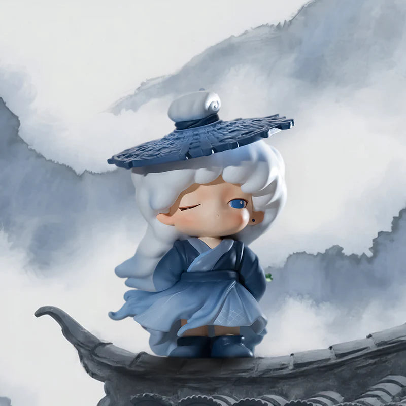 YUMO figure as a wandering knight wearing blue robes and hat
