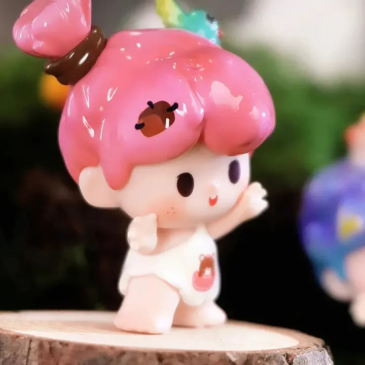 Zozo figure with pink hair bun and baby outfit from Lucky Double Treasure Series Blind Box