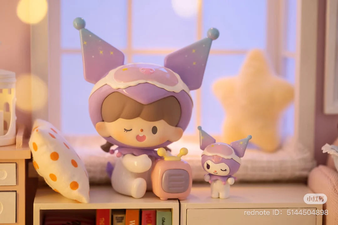 Kuromi-inspired zZoton figure relaxing with a miniature television during bedtime