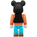 Back view of Bearbrick figure styled as Disney's Goofy with orange shirt, blue pants, and black vest.