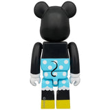 Back of Bearbrick figure dressed as Minnie Mouse with blue polka dot skirt, yellow shoes, and black upper body.