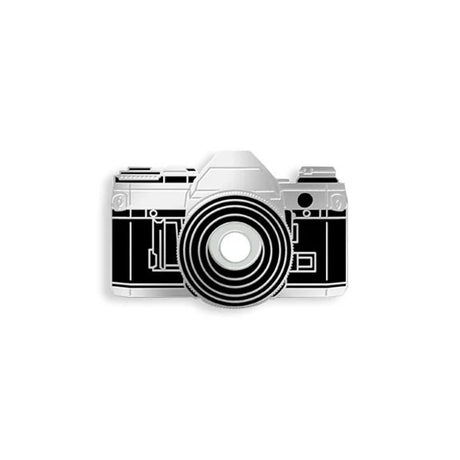 Close-up of 35mm camera enamel pin by Yesterdays