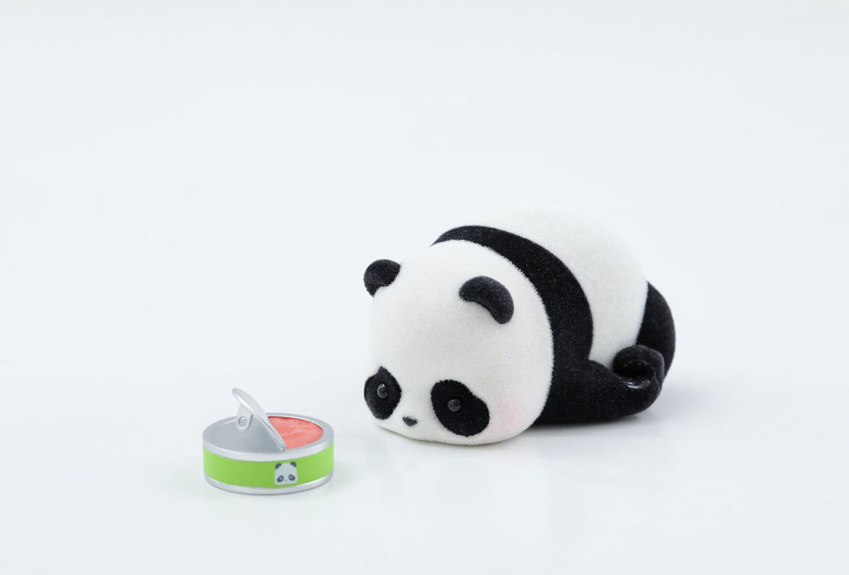 Panda Roll Panda As A Cat blind box figure lying down next to canned food accessory