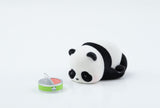 Panda Roll Panda As A Cat blind box figure lying down next to canned food accessory