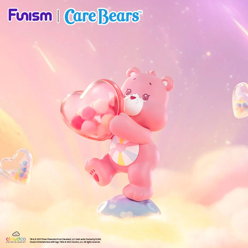 Hopeful Heart Bear from the Care Bears Planet of Joy Series carrying a heart-shaped candy box