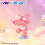 Hopeful Heart Bear from the Care Bears Planet of Joy Series carrying a heart-shaped candy box