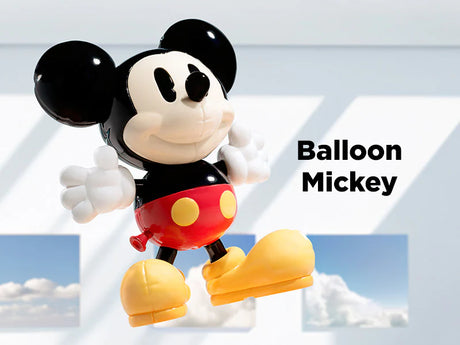Balloon Mickey vinyl figure floating in the air from Disney 100th Anniversary Ever Curious Blindbox.