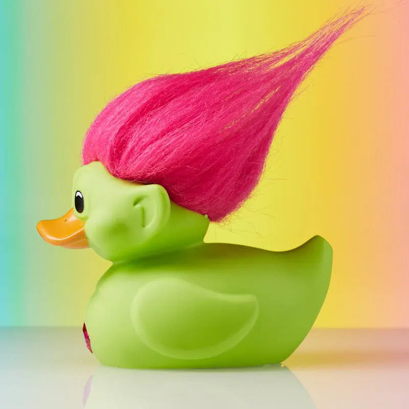 Left profile of green TUBBZ Troll duck with pink hair