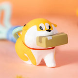 Puppy Crossing blind box figure with yellow Shiba carrying a package and mint blue lanyard