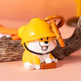 Puppy Crossing blind box collectible Shiba in a yellow construction helmet holding a brick