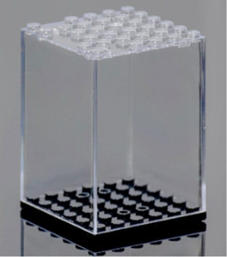 Empty clear acrylic mini figure display case with black studded base
