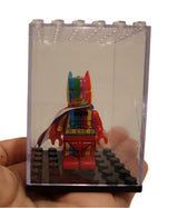 Mini figurine acrylic display case showing rainbow Batman minifigure inside