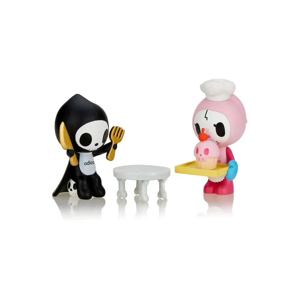 Bone Appetit vinyl figure with Ciao Ciao serving a skull cupcake to hungry Adios