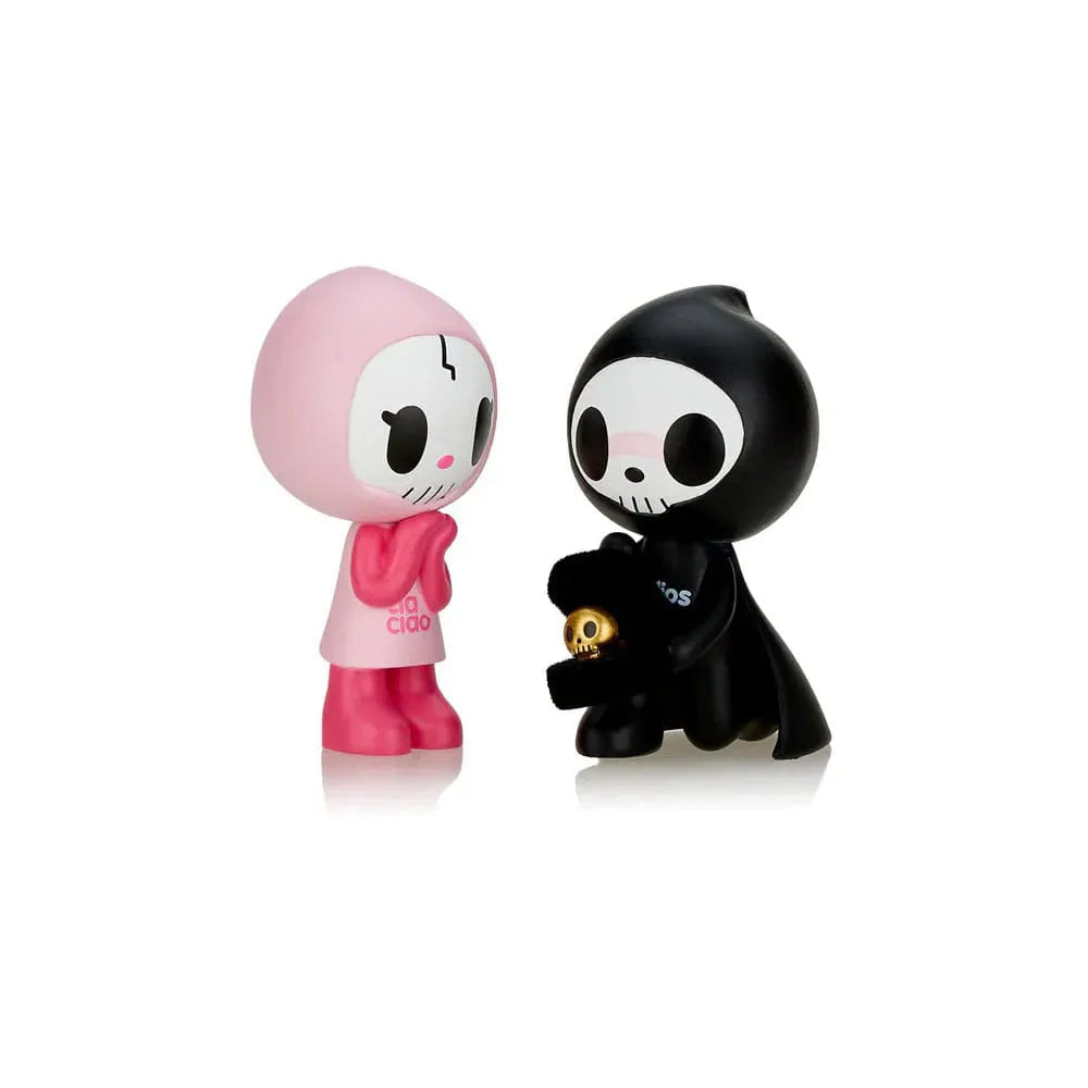 Adios & Ciao Ciao Together Forever vinyl figure showing Adios on one knee holding a skull