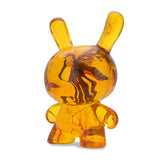 Rear angle view of Amber Dunny 8 inch resin designer art toy