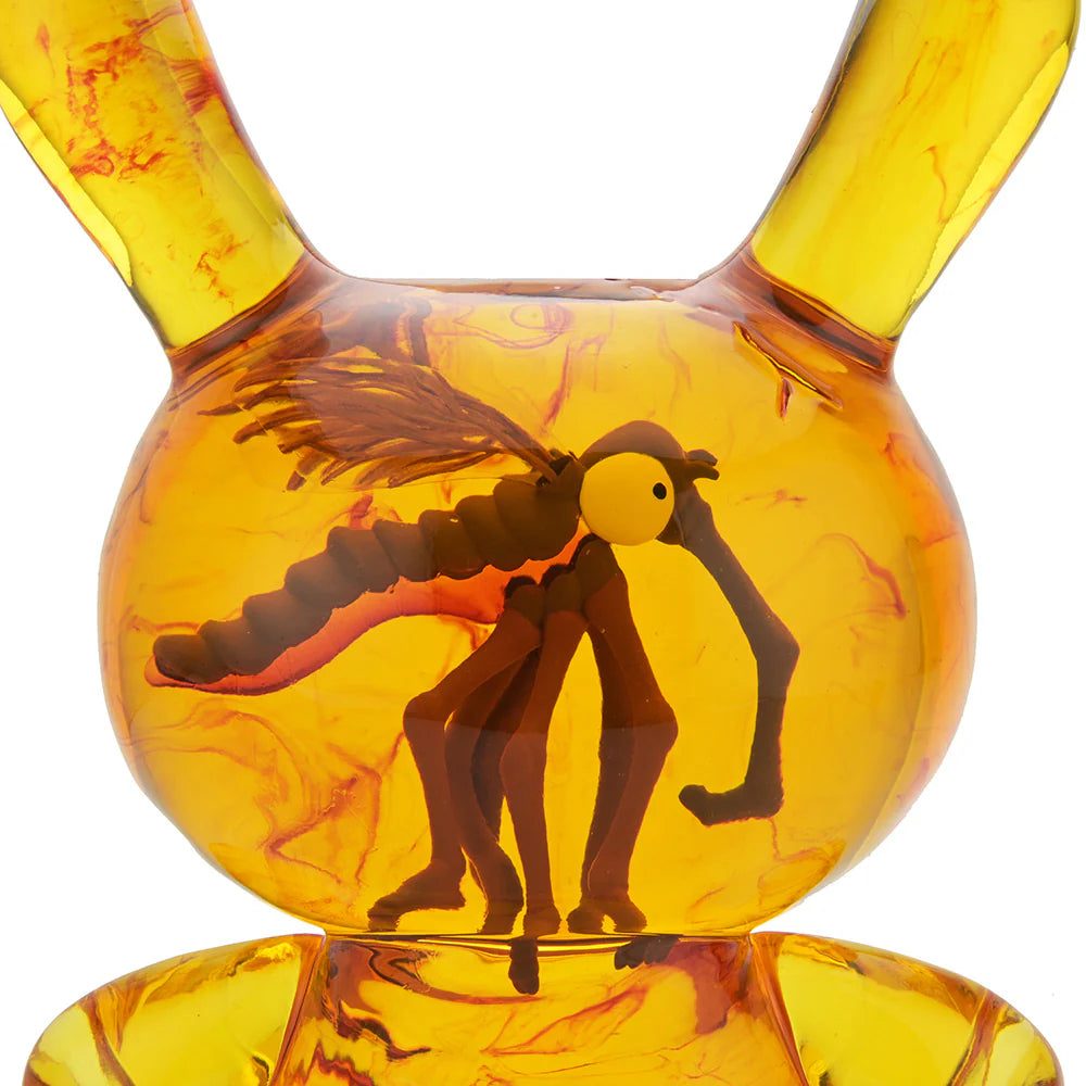 Front profile of Amber Dunny resin figure showing insect suspended inside