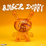 Detailed close-up of preserved insect artwork inside Amber Dunny figure