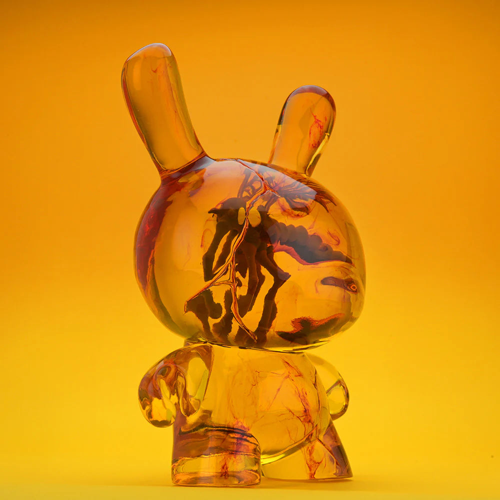 Side promotional view of Amber Dunny translucent resin Dunny collectible