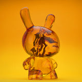 Side promotional view of Amber Dunny translucent resin Dunny collectible