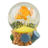 Blinky The Simpsons snow globe featuring the three-eyed fish floating above a Springfield Nuclear Power Plant themed base with yellow glitter