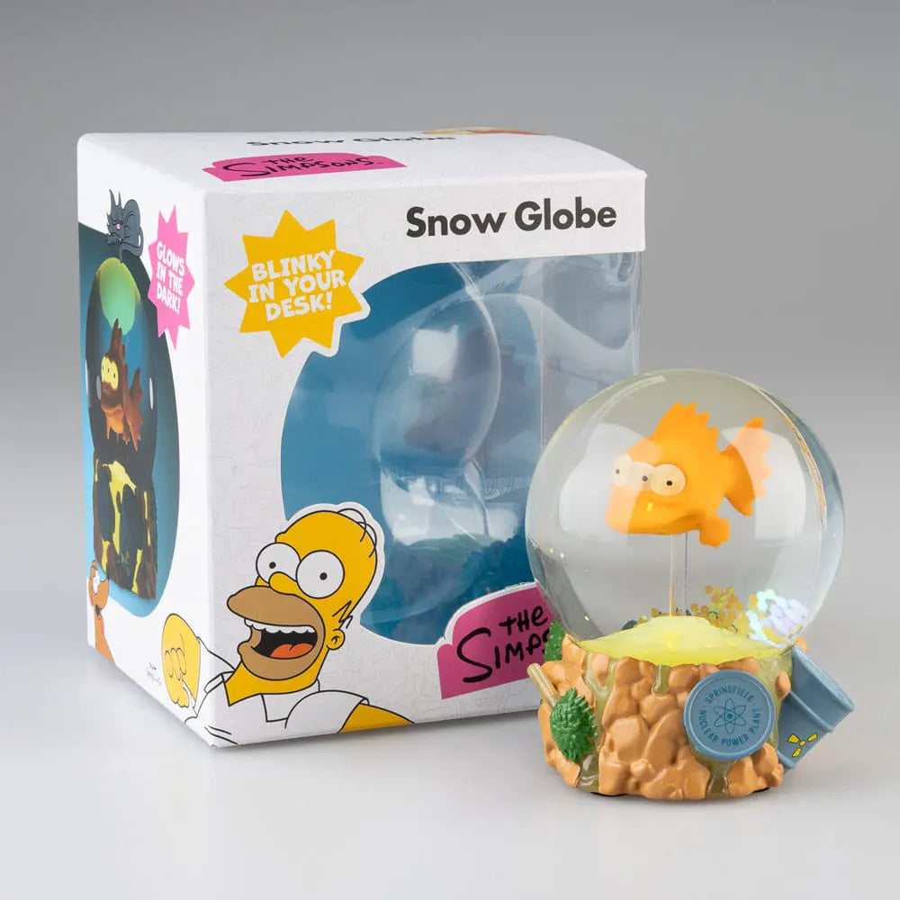 Blinky The Simpsons snow globe displayed next to its collector packaging featuring Homer Simpson artwork