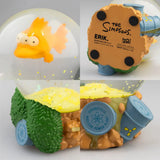 Detailed close-up views of The Simpsons Blinky snow globe showing the fish, radioactive barrels and Springfield Nuclear Power Plant details