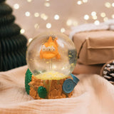Blinky The Simpsons snow globe displayed as a decorative collectible with sparkling glitter and Springfield inspired scenery