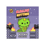 Boomu Kaiju Kitties enamel pin displayed on branded backing card with city and kaiju theme artwork