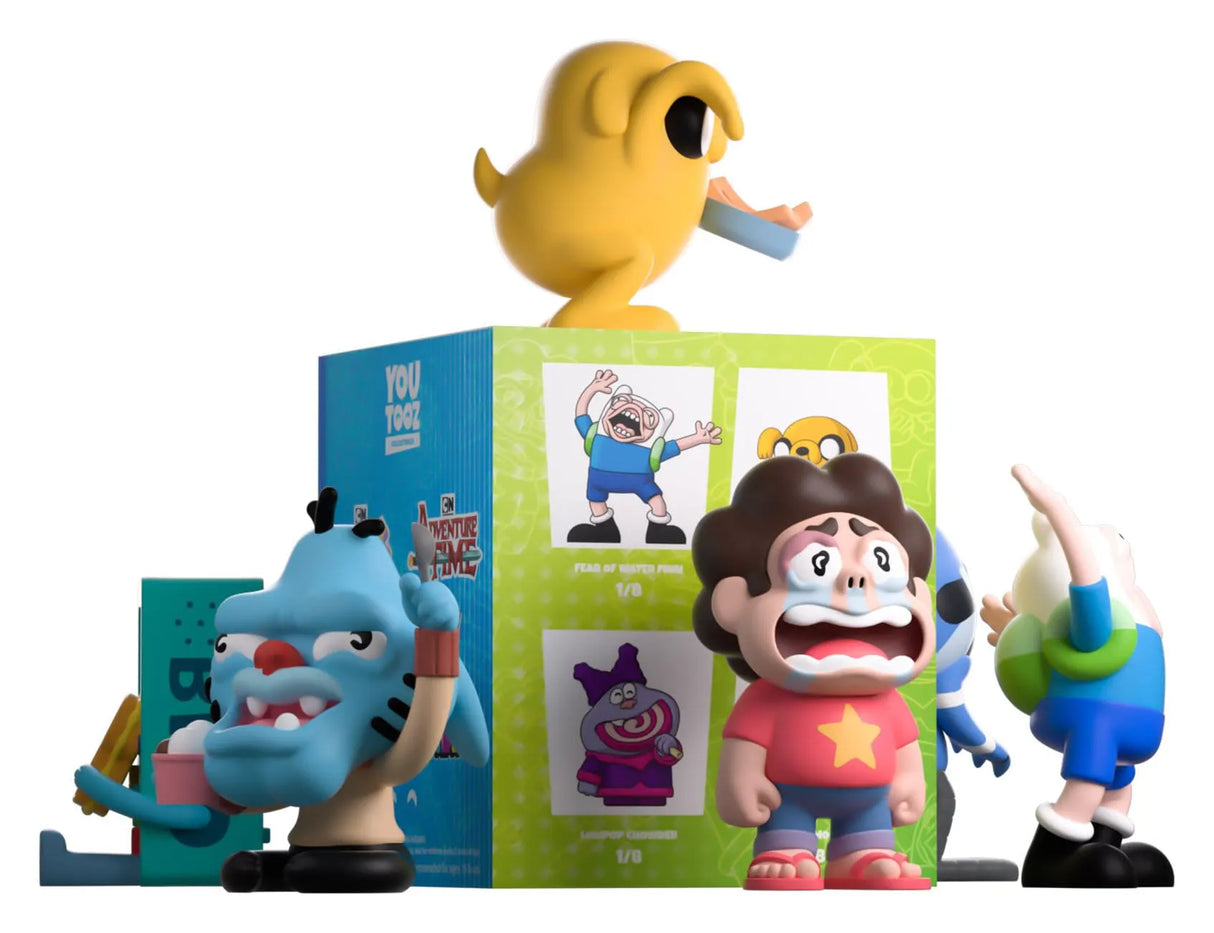 Cartoon Network blind box mini figures with Steven Universe, Finn and Caveman Gumball displayed around collector packaging