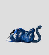 Catscans cat figure in playful pose with glowing interior elements