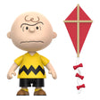 Close-up of Charlie Brown ReAction Figure showing yellow shirt and classic Peanuts design